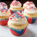 Festive 4th of July cupcakes decorated with red, white, and blue frosting.