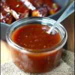Homemade roasted rhubarb barbecue sauce in a jar