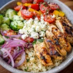 Greek Chicken Bowl with fresh veggies and flavorful sauce