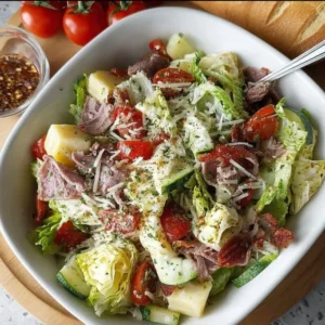 Colorful Italian Grinder Salad with fresh vegetables and meats on a plate