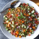 Healthy lentil salad recipe with fresh vegetables and dressing