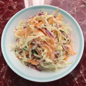 Delicious coleslaw with papaya and vibrant vegetables
