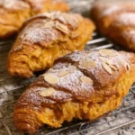 Delicious homemade pumpkin croissants with golden flaky layers
