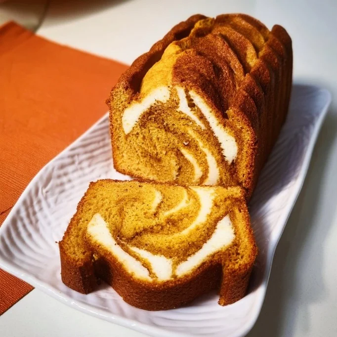 Delicious Pumpkin Swirl Cake with creamy frosting and autumn spices