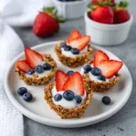 Delicious budget-friendly granola berry cups served on a plate