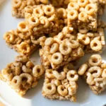 Deliciously homemade Peanut Butter Cheerio Bars with a crunchy texture.