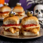 Halloween chicken parm sliders served on a festive platter