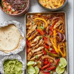 Delicious sheet pan chicken fajitas with colorful peppers and onions