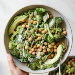 Bowl of Simple Green Goodness Chickpea Salad with fresh vegetables and herbs
