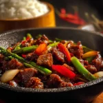 Stir-fried black pepper beef with vibrant vegetables in a gourmet dish