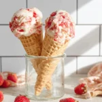 Homemade swirled strawberry ice cream served in a bowl