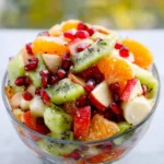 Colorful winter fruit salad with seasonal fruits in a bowl