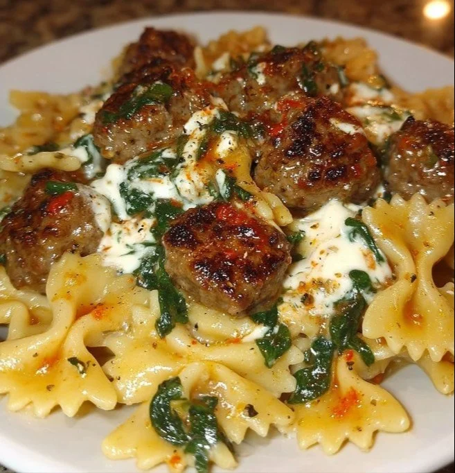 Delicious creamy pasta topped with herbs and cheese, perfect for satisfying cravings.