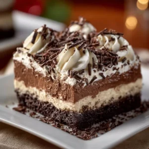 Decadent Brownie Refrigerator Cake with layers of chocolate and creamy filling