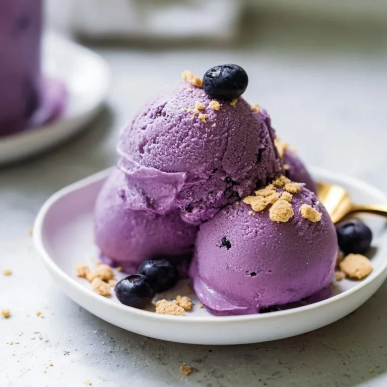 Protein ice cream blueberry cheesecake dessert bowl with fresh blueberries
