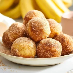 Delicious 2-ingredient dough banana donut holes on a plate