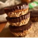 Delicious homemade peanut butter oat cups with chocolate and nuts