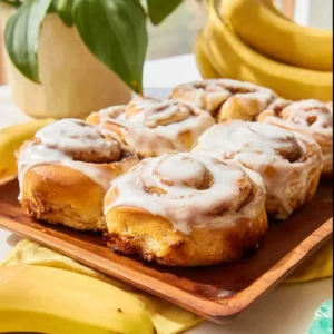 Delicious 5-ingredient banana bread cinnamon rolls topped with cinnamon and sugar.